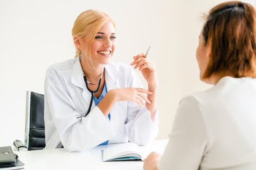 woman talking with her doctor