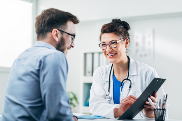 Patient reviewing chart with doctor